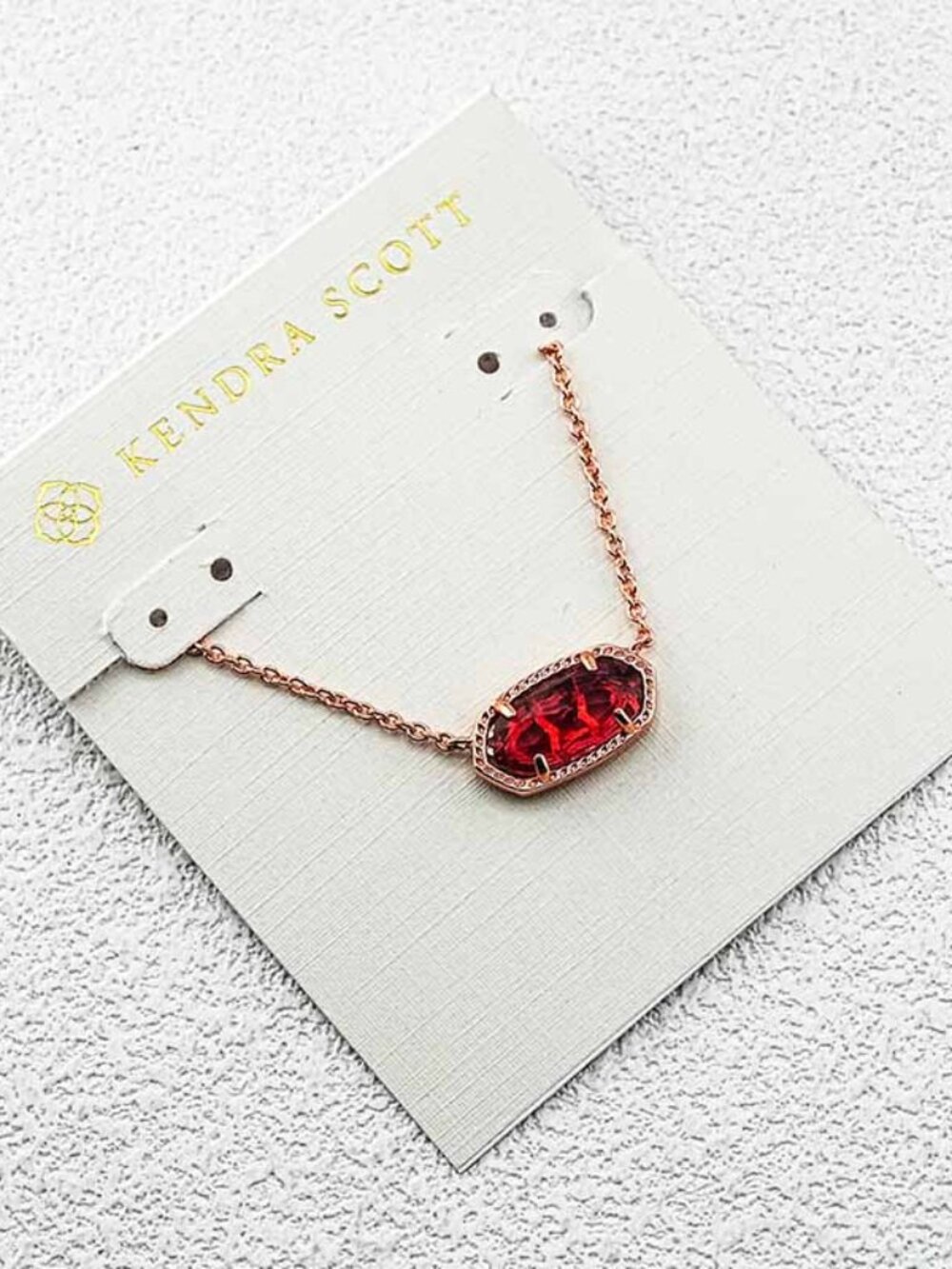 Kendra Scott Rose Gold Necklace with Ruby Red Faceted Pendant